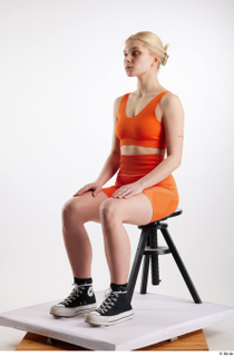 Unaisa  1 black sneakers dressed orange bike shorts orange…